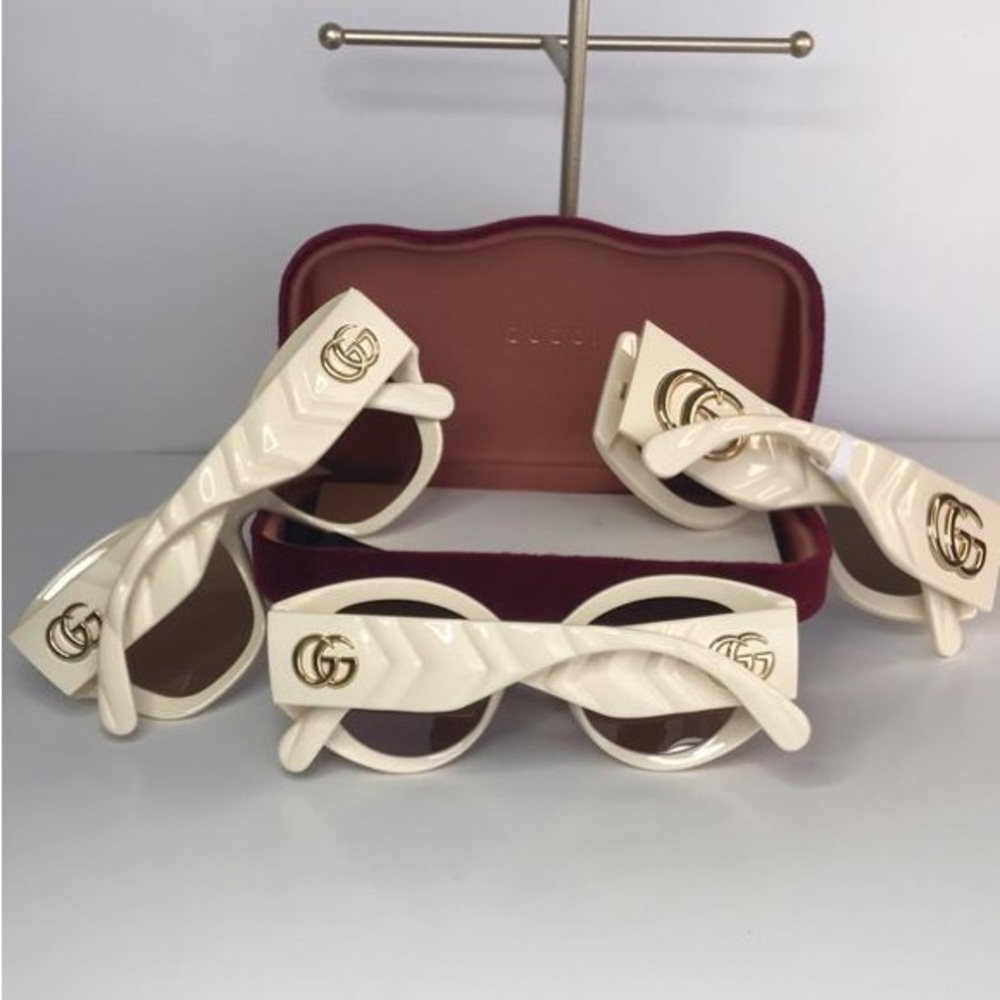 GUCCI GG0809S 002 cat eye sunglass comes in a ivory frame with brown lenses. - Picture 14 of 15